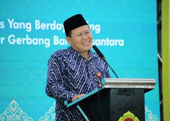 Asisten Administrasi Umum Sekdaprov Jatim, Akhmad Jazuli menyampaikan apresiasi Gubernur atas sinergitas LDII dan Pemprov Jatim pada kegiatan Muswil X LDII Jatim, Sabtu (30/8). Dok: LINES.