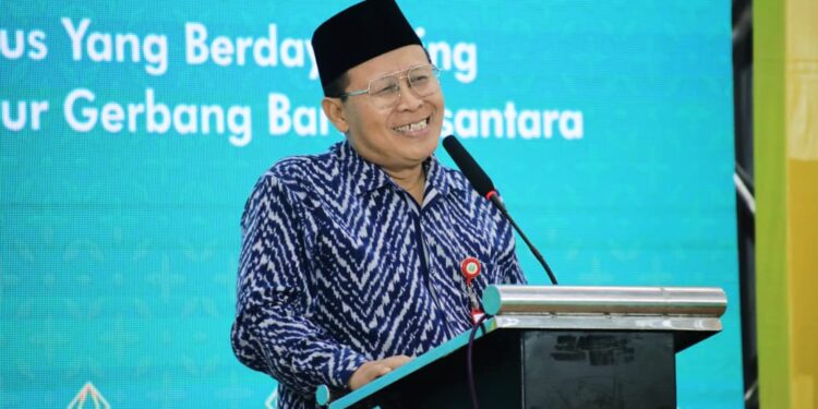 Asisten Administrasi Umum Sekdaprov Jatim, Akhmad Jazuli menyampaikan apresiasi Gubernur atas sinergitas LDII dan Pemprov Jatim pada kegiatan Muswil X LDII Jatim, Sabtu (30/8). Dok: LINES.