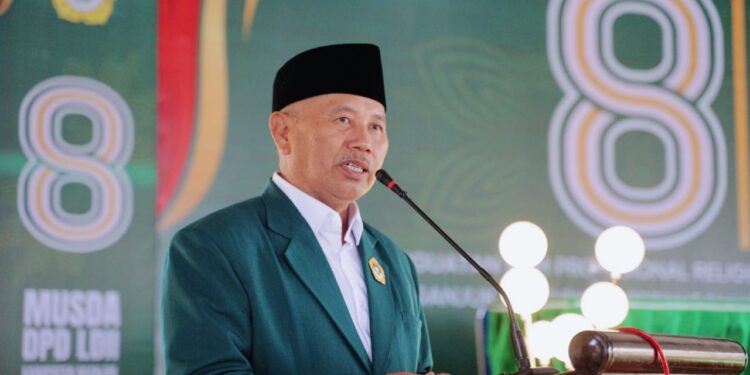 Ketua DPD LDII Nganjuk, Murkani, menyampaikan sambutan usai terpilih kembali secara aklamasi dalam Musyawarah Daerah (Musda) VIII LDII Nganjuk masa bakti 2025–2030 yang digelar di Gedung DPD LDII Nganjuk, Rabu (24/9). Dok: LINES.