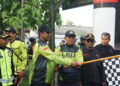 gowes ldii tapal kuda | LDII JAWA TIMUR Ketua DPD LDII Kabupaten Jember H Akhmad Malik Afandi membuka kegiatan gowes bersama dengan mengibarkan bendera start sebagai tanda dimulainya acara Dok LINES Jember