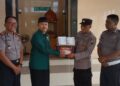 ldiiterimamushafalquranjelanghutbhayangkara | LDII JAWA TIMUR Kapolsek Glagah AKP Edi Jaka Supaat menyerahkan bantuan mushaf Al Quran kepada Takmir Masjid Baitul Jannah LDII Glagah dalam rangkaian HUT Bhayangkara Foto LINES Banyuwangi