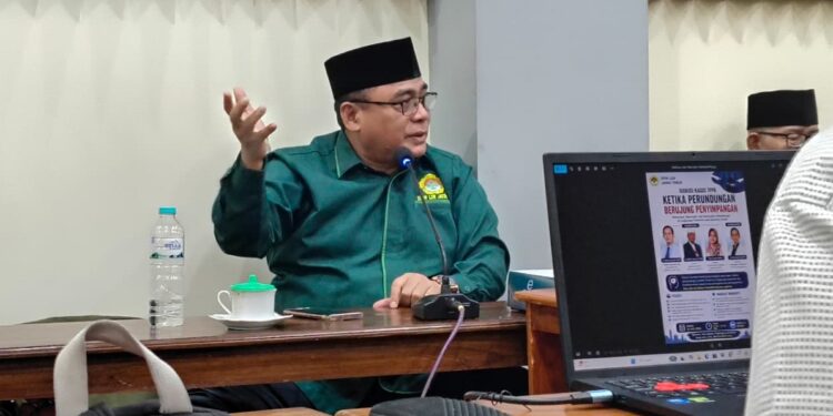 Ketua DPW LDII Jawa Timur Moch Amrodji Konawi memimpin rapat pengurus harian Rabu 872026 Foto LINES Jatim