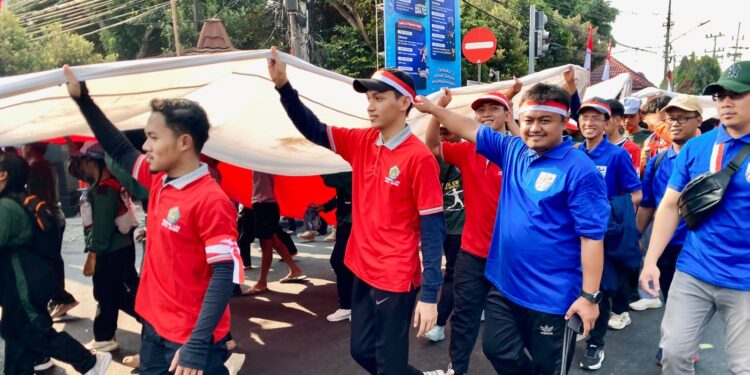 PemudaLDIIKediriIkutiKirabBenderaMerahPutih | LDII JAWA TIMUR Pemuda LDII Kota Kediri mengikuti Kirab Merah Putih bersama 1147 peserta untuk memperingati HUT ke 81 RI Minggu 1692026 Foto LINES Kediri