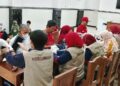 CKGLDIISIDOARJO | LDII JAWA TIMUR Petugas Puskesmas Barengkrajan melayani warga dalam pemeriksaan Cek Kesehatan Gratis CKG yang digelar LDII Sidoarjo di Ponpes Al Huda Minggu 1392026 Foto LINES Sidoarjo