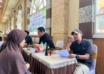 Seorang peserta mengikuti pemeriksaan kesehatan dalam kegiatan Cek Kesehatan Gratis (CKG) yang digelar DPD LDII Kabupaten Malang, Minggu (13/9/2026). Foto: LINES Malang