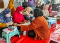 LDII Kamal gelar CKG 3 | LDII JAWA TIMUR Seorang warga LDII memanfaatkan layanan Cek Kesehatan Gratis CKG yang digelar di halaman Masjid Agung Aulia Kamal Dok LINES Jatim